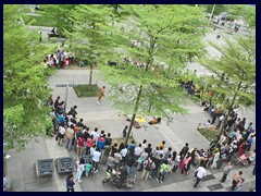 People gather on a sunday in Futian district.